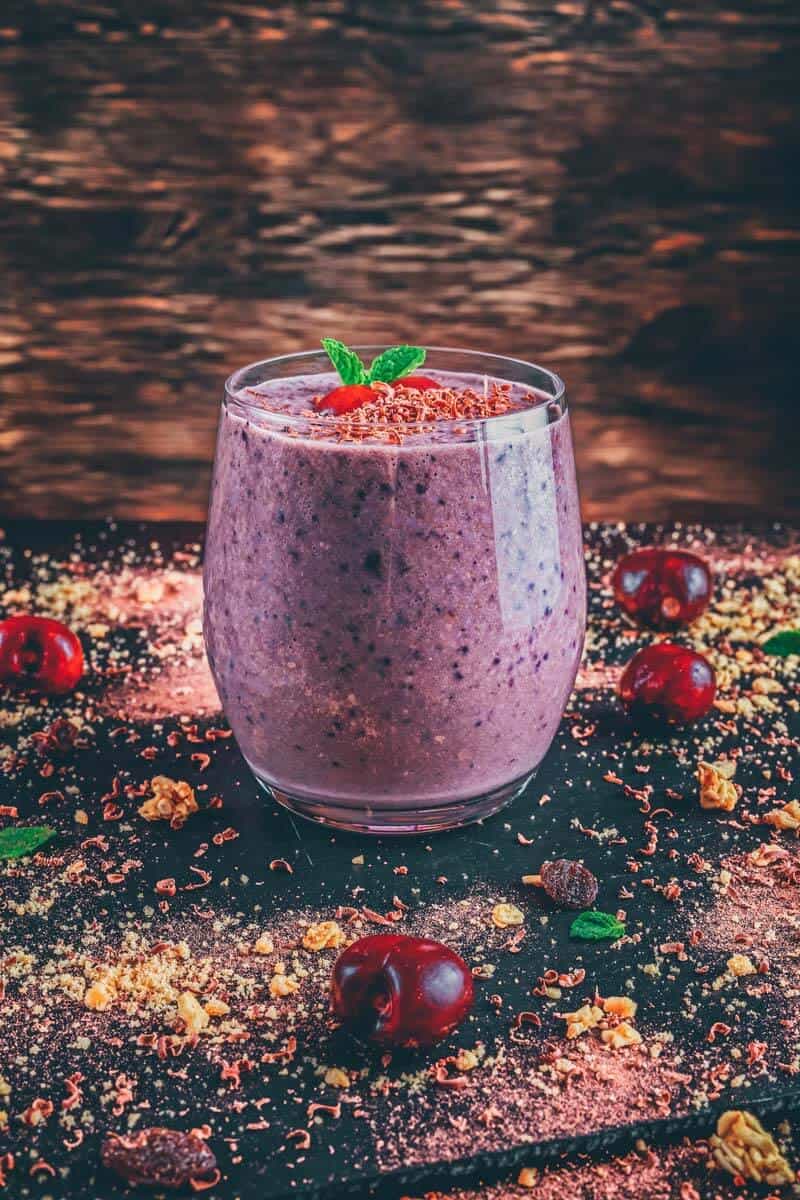 Chocolate cherry smoothie in a glass cup