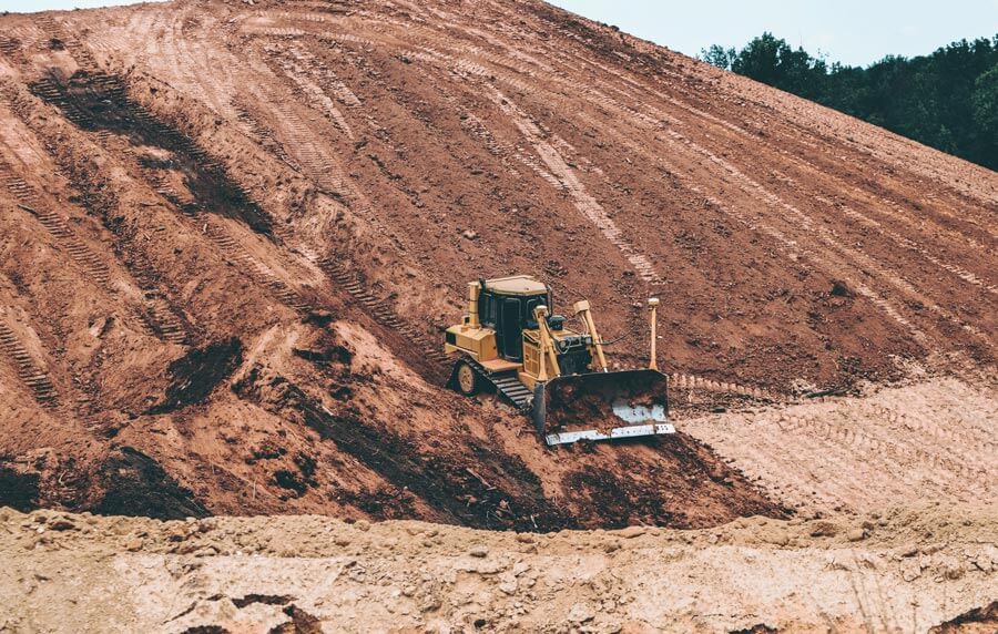 Bulldozer in dirt at Dig this Las Vegas