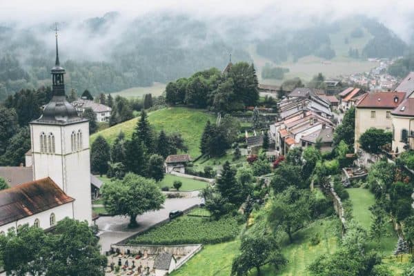 15 prettiest towns in Switzerland! Aerial view of the Swiss town, Adelboden. One of the top things to see in Switzerland! If you are planning a road trip through Switzerland you do not want to miss these small towns! #avenlylanetravel #avenlylane #switzerland #europebucketlist #travel