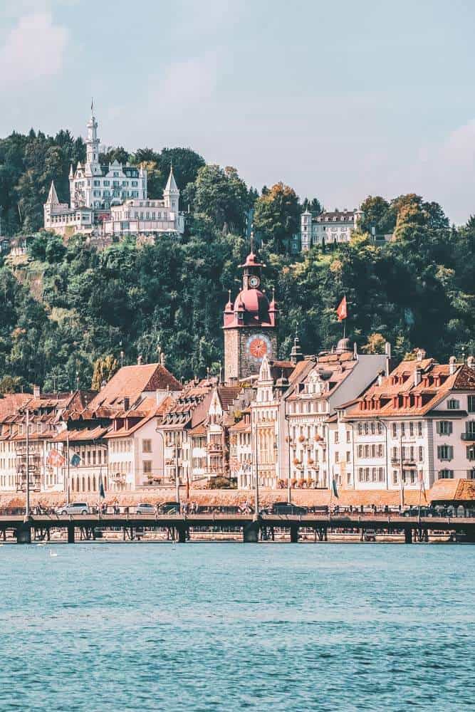 Lucern, Switzerland, one of the The 15 Prettiest Towns in Switzerland. If you are planning a vacation in Switzerland you HAVE to visit these 15 top places in Switzerland. They are incredible! See 14 others on www.avenlylane.com #avenlylanetravel #avenlylane #travelinspiration #travel #beautifulplaces #europe #switzerland