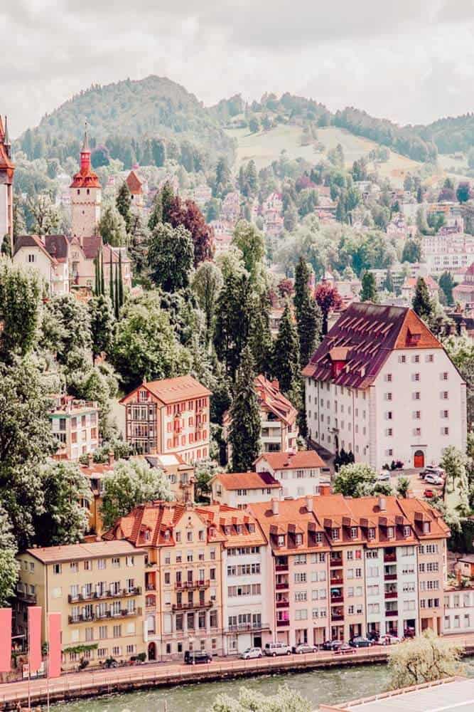 Lucern, Switzerland, one of the The 15 Prettiest Towns in Switzerland. If you are planning a vacation in Switzerland you HAVE to visit these 15 top places in Switzerland. They are incredible! See 14 others on www.avenlylane.com #avenlylanetravel #avenlylane #travelinspiration #travel #beautifulplaces #europe #switzerland