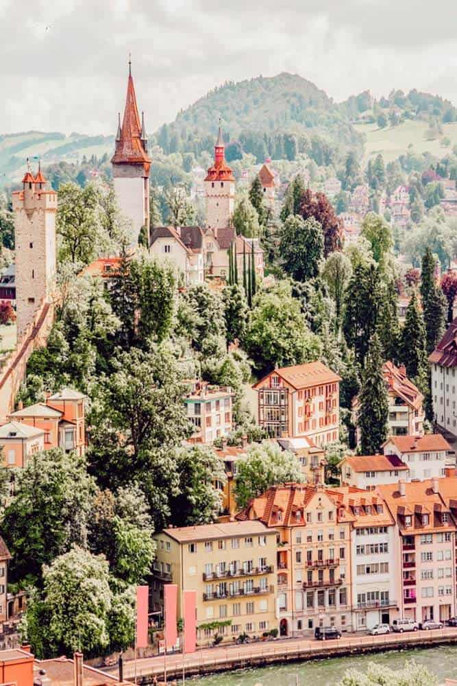 Lucern, Switzerland, one of the The 15 Prettiest Towns in Switzerland. If you are planning a vacation in Switzerland you HAVE to visit these 15 top places in Switzerland. They are incredible! See 14 others on www.avenlylane.com #avenlylanetravel #avenlylane #travelinspiration #travel #beautifulplaces #europe #switzerland