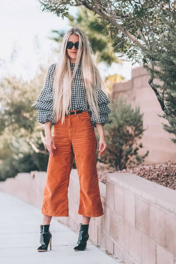 Fall Fashion Trends: Corduroy Culottes. This is one of the must have fall fashion items of the season. They are so flattering on so many different body types and super comfortable. Have you guys tried them? Check out the post and let me know if you would wear them! | www.avenlylane.com #fashion #avenlylane #avenlylanefashion #fallfashion #ootd #falloutfits #falloutfit #boots #booties #culottes #falltrends #fashiontrends