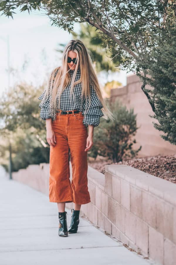 Fall Fashion Trends: Corduroy Culottes. This is one of the must have fall fashion items of the season. They are so flattering on so many different body types and super comfortable. Have you guys tried them? Check out the post and let me know if you would wear them! | www.avenlylane.com #fashion #avenlylane #avenlylanefashion #fallfashion #ootd #falloutfits #falloutfit #boots #booties #culottes #falltrends #fashiontrends