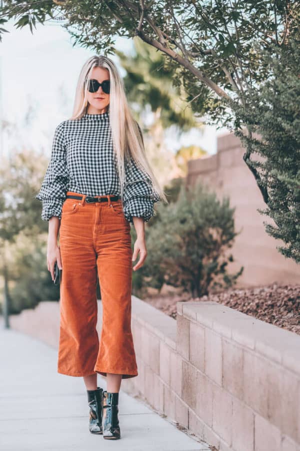 Fall Fashion Trends: Corduroy Culottes. This is one of the must have fall fashion items of the season. They are so flattering on so many different body types and super comfortable. Have you guys tried them? Check out the post and let me know if you would wear them! | www.avenlylane.com #fashion #avenlylane #avenlylanefashion #fallfashion #ootd #falloutfits #falloutfit #boots #booties #culottes #falltrends #fashiontrends