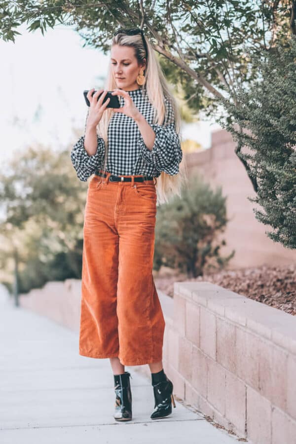 Fall Fashion Trends: Corduroy Culottes. This is one of the must have fall fashion items of the season. They are so flattering on so many different body types and super comfortable. Have you guys tried them? Check out the post and let me know if you would wear them! | www.avenlylane.com #fashion #avenlylane #avenlylanefashion #fallfashion #ootd #falloutfits #falloutfit #boots #booties #culottes #falltrends #fashiontrends